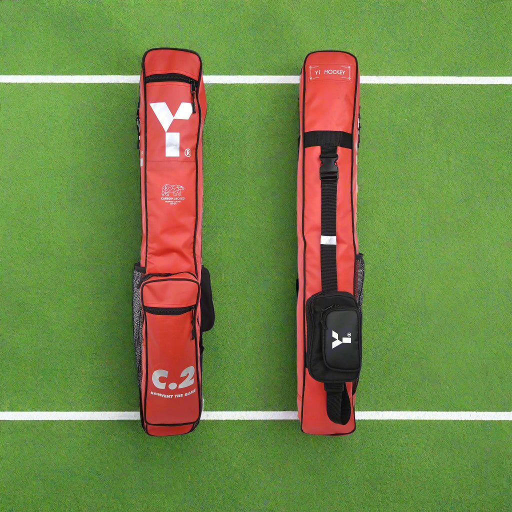A red and silver stickbag with the logo 'C.2' on the side, designed for carrying field hockey sticks and accessories.