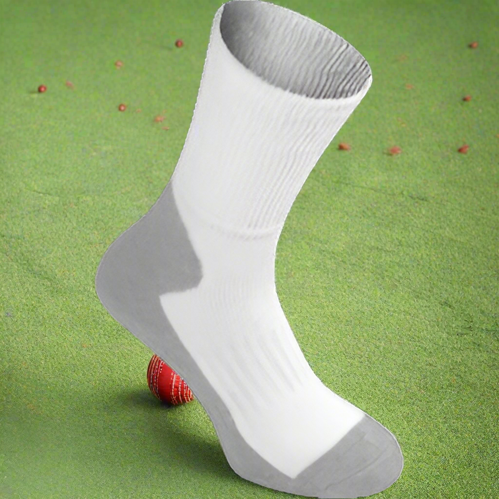 A pair of white and gray Nicolls cricket socks with a visible brand logo on the ankle support.