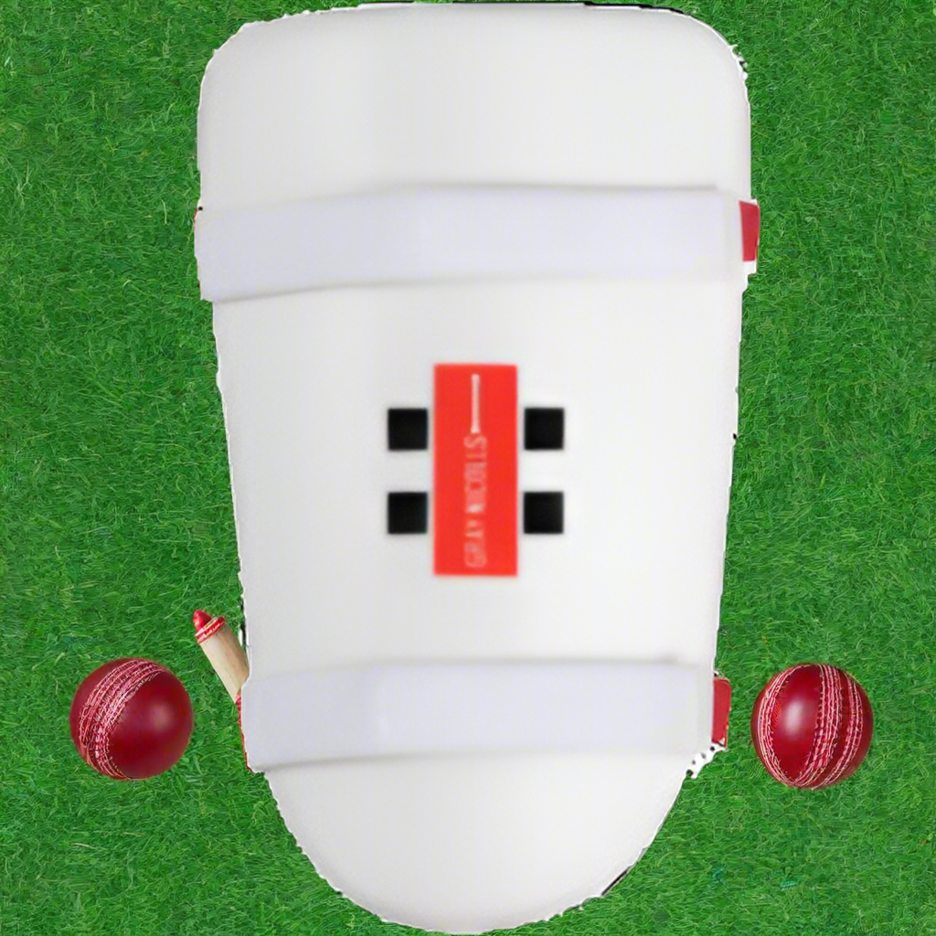 A white thigh pad with an adjustable waist strap featuring the Gray Nicolls logo.