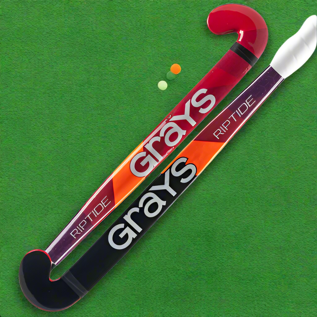 Two Grays Riptide Ultrabow field hockey sticks, one with red and black coloring and the other with orange and black, both featuring the Grays logo.