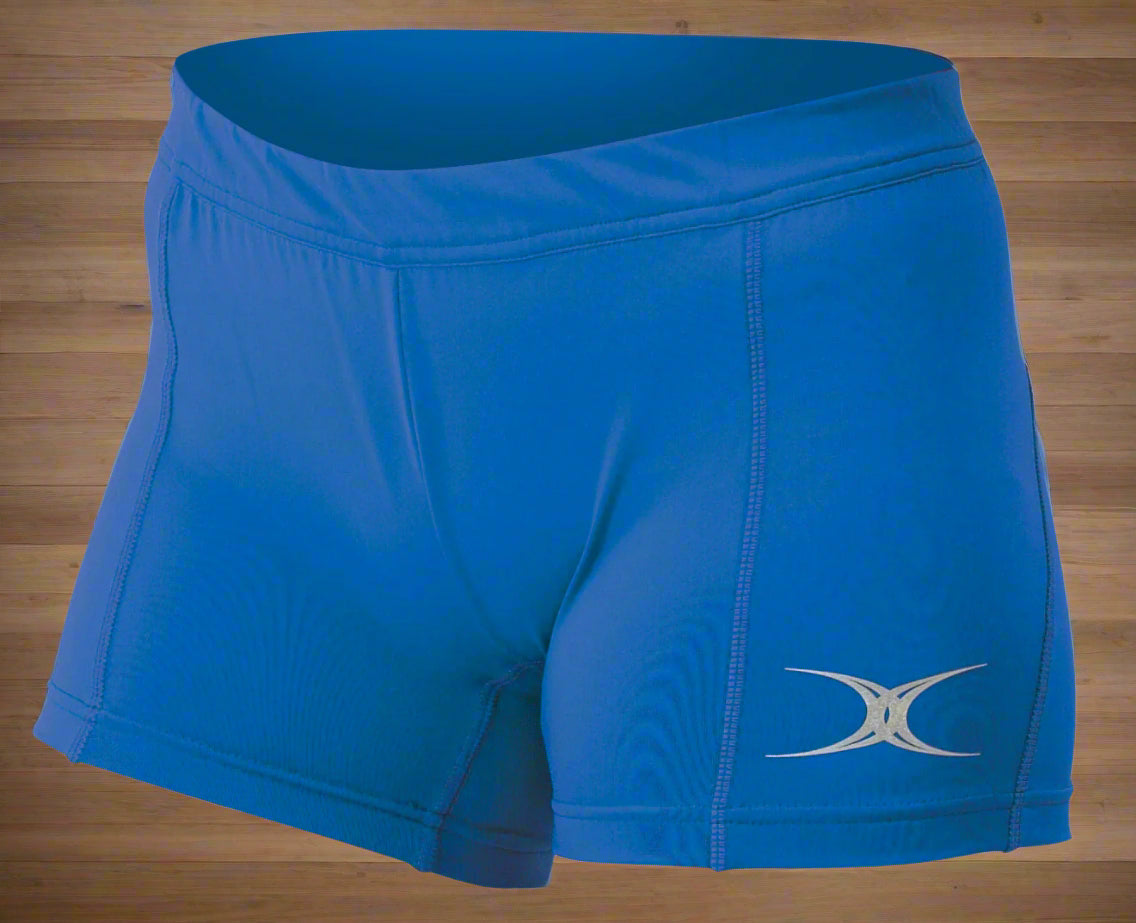 Royal blue netball training shorts with a visible brand logo on the right leg.