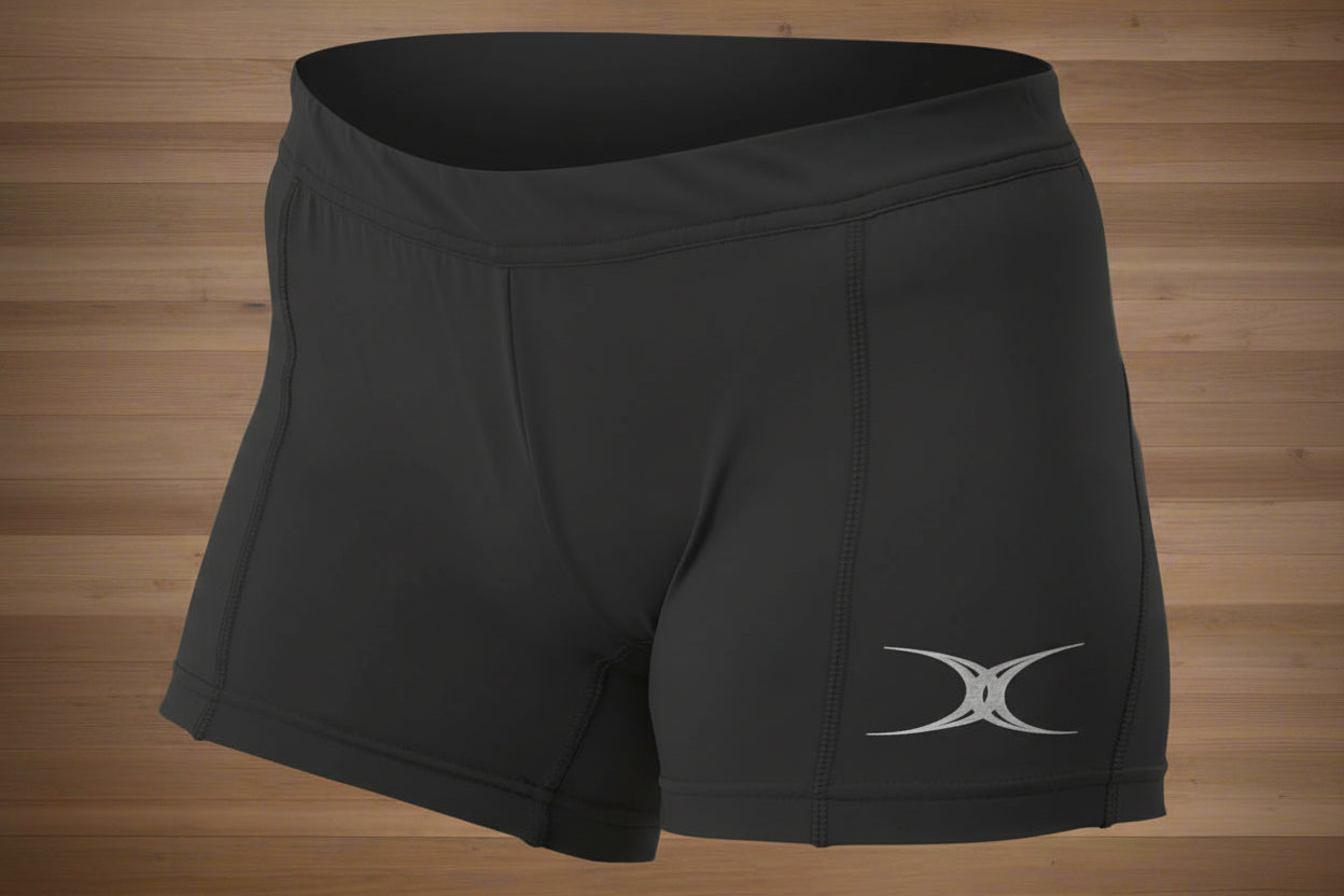 Royal blue netball training shorts with a visible brand logo on the right leg.