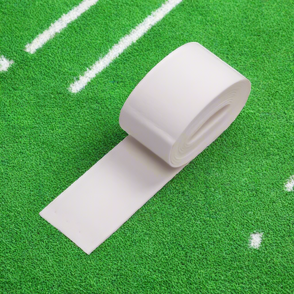 A roll of white chamois grip for field hockey or lacrosse sticks.