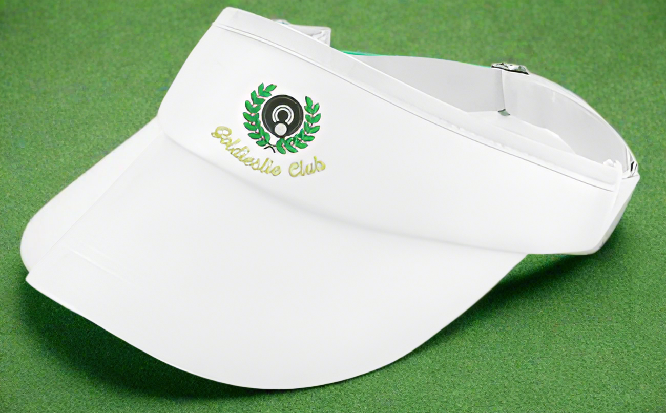 A white visor with the Goldieslie Bowls Club logo embroidered in green and black on the front.