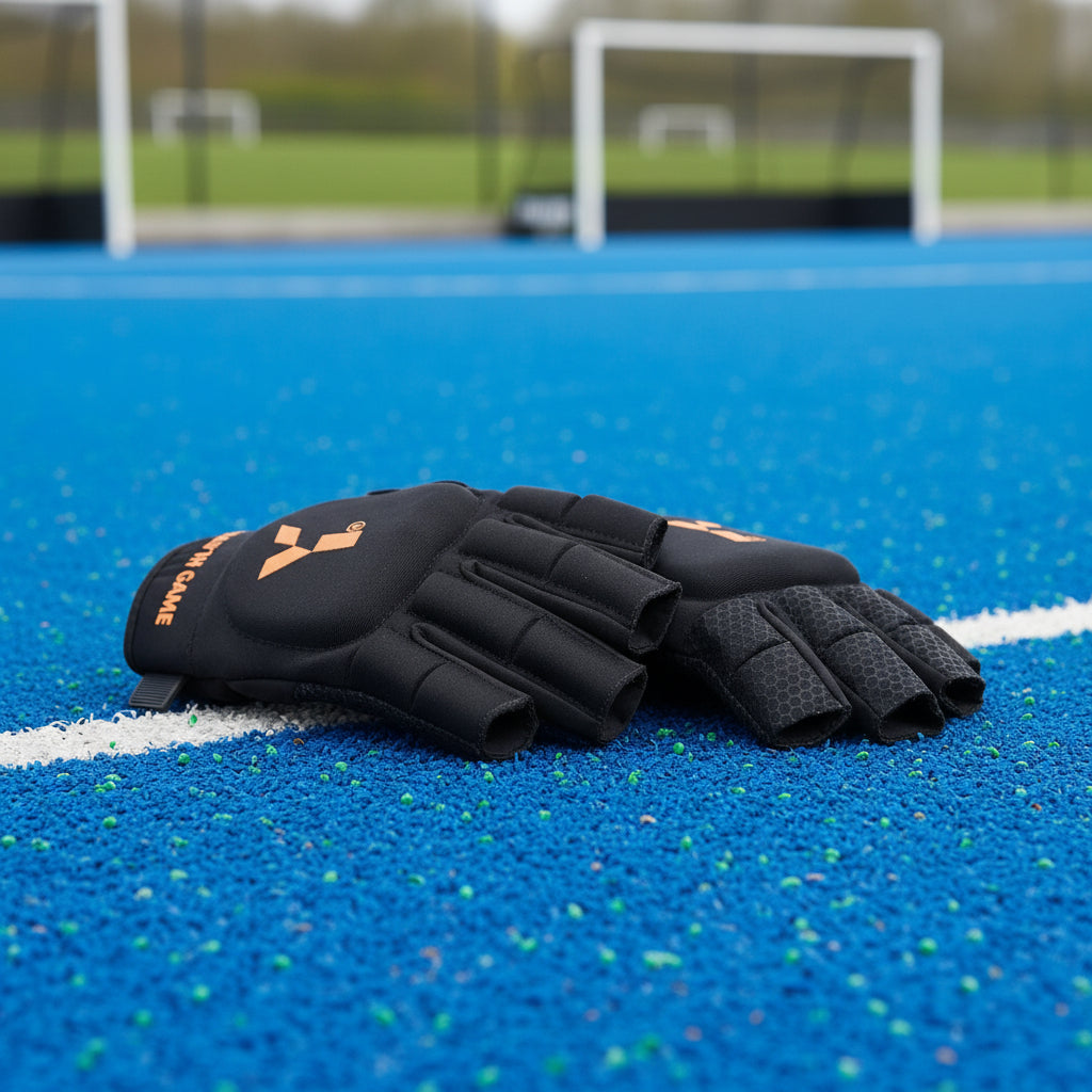 Black gloves with orange text and logo on a white background