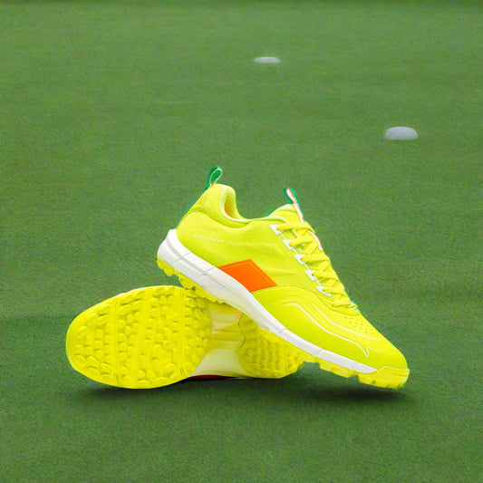 Bright yellow running shoes with a white sole on a light gray background