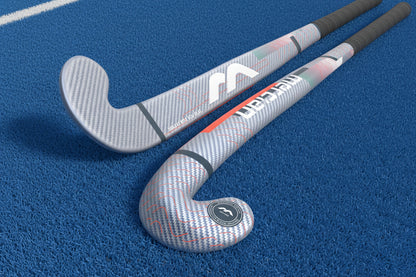 Two hockey sticks with a brand logo on a white background