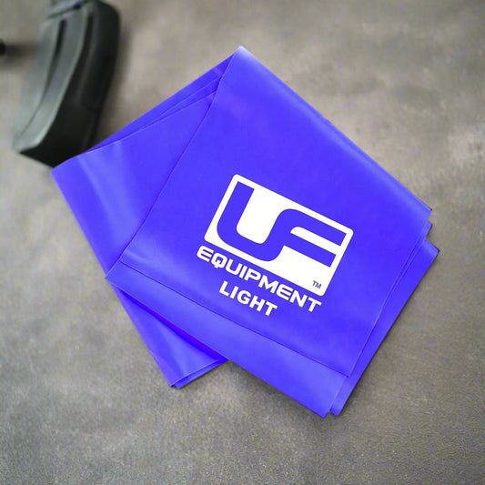 A blue latex resistance band with the logo 'UF Equipment Light' printed on it.