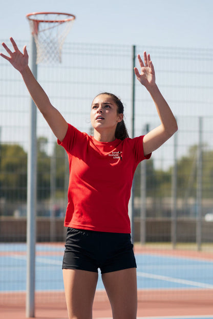 Red t-shirt with 'Elmdon Netball Club' logo on a white background