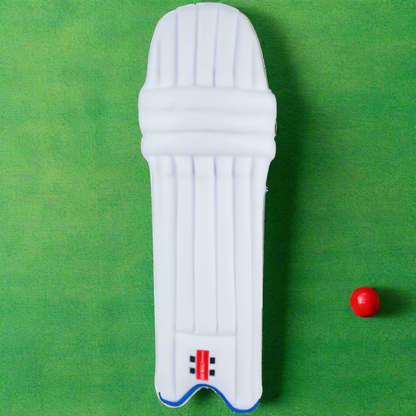 A single white cricket pad with a diffuser foam bolster and cashmillon knee protection, designed for junior cricketers.